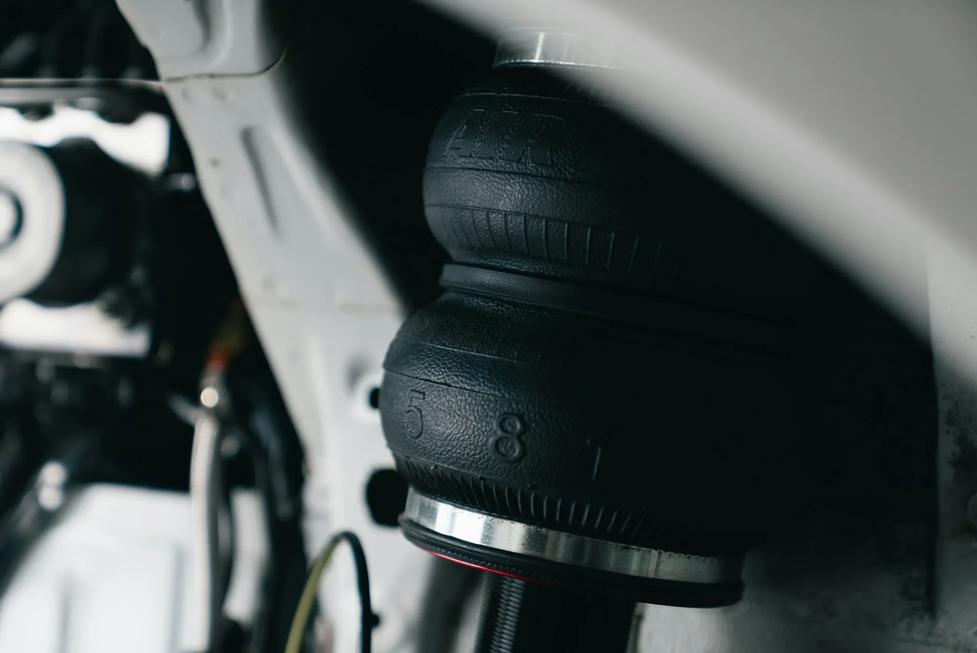 Air suspension spring on a vehicle